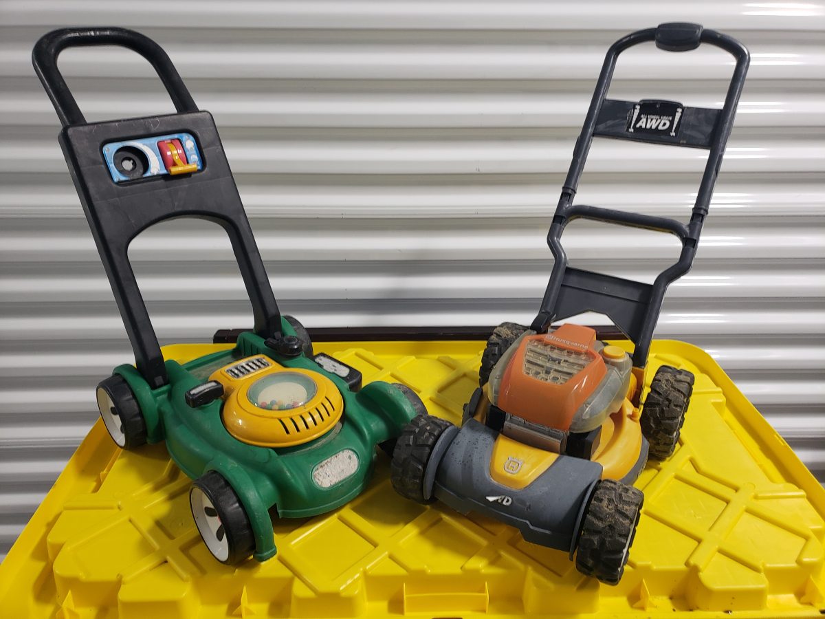 Two Children's Toy Lawn Mowers